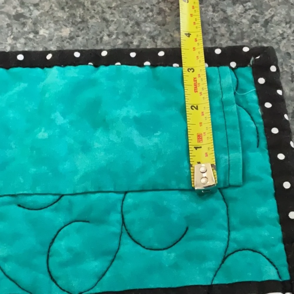 Quilted Happiness fabric wall hanging for people who sew.